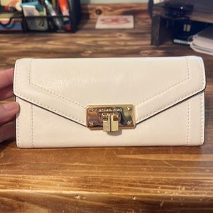 Michael Kors large white wallet.